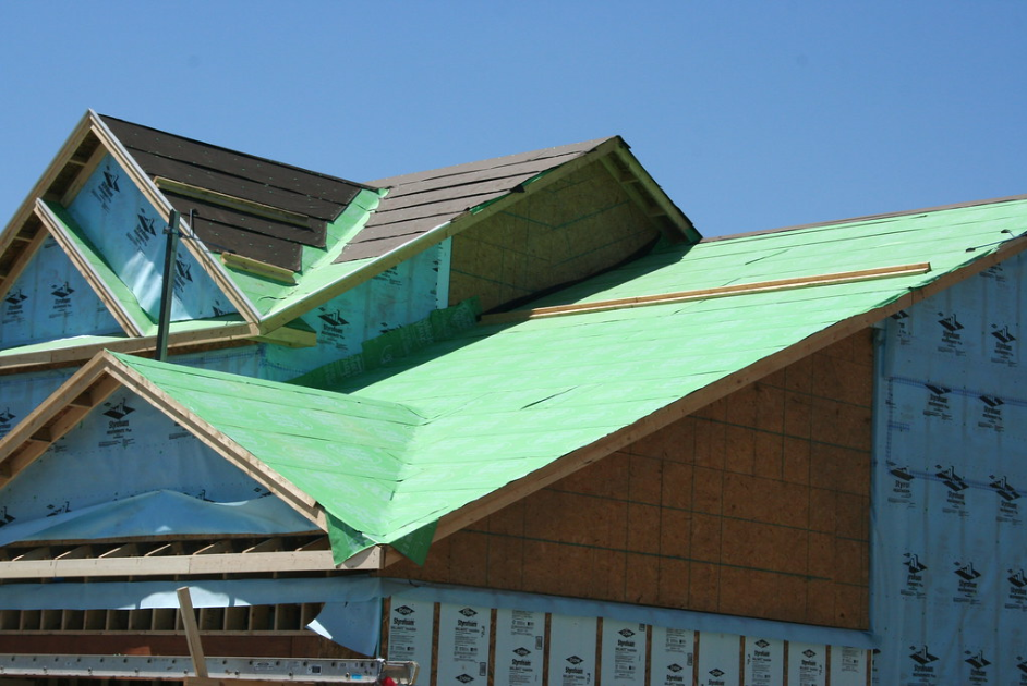 Large roof in progress showing the decking/sheathing.