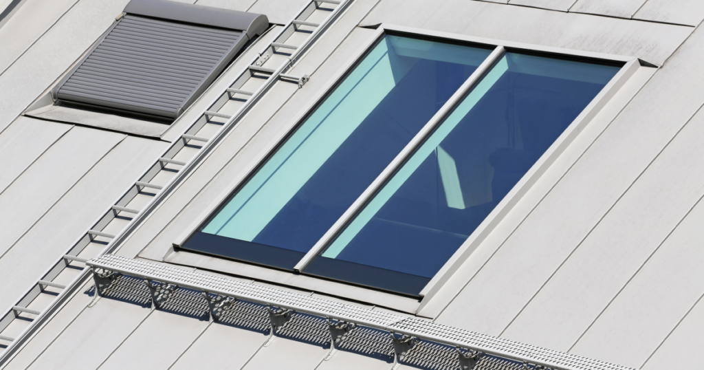 close up of skylight on light grey roof