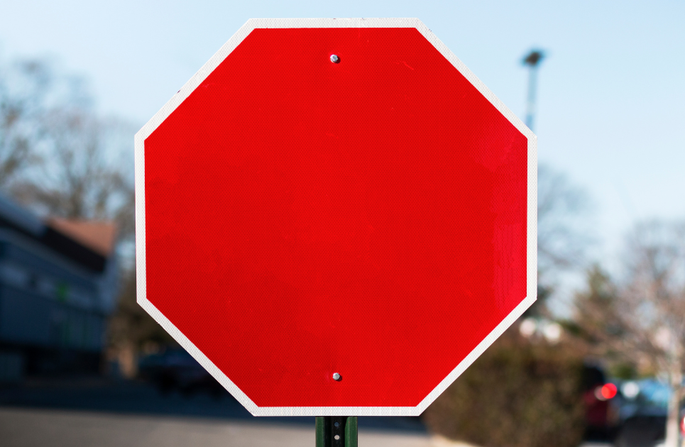 a red blank stop sign