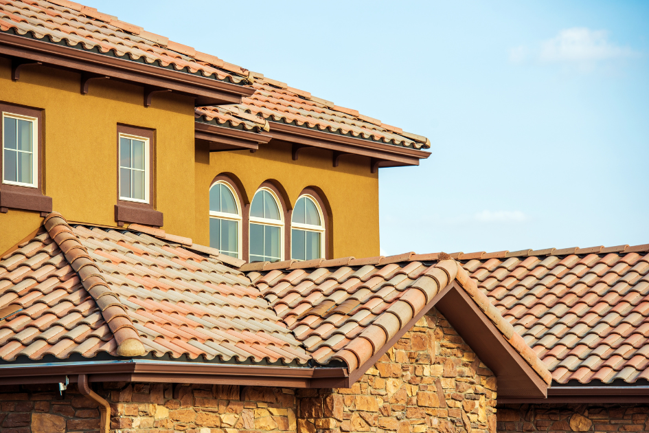 mustard yellow home with tile roof