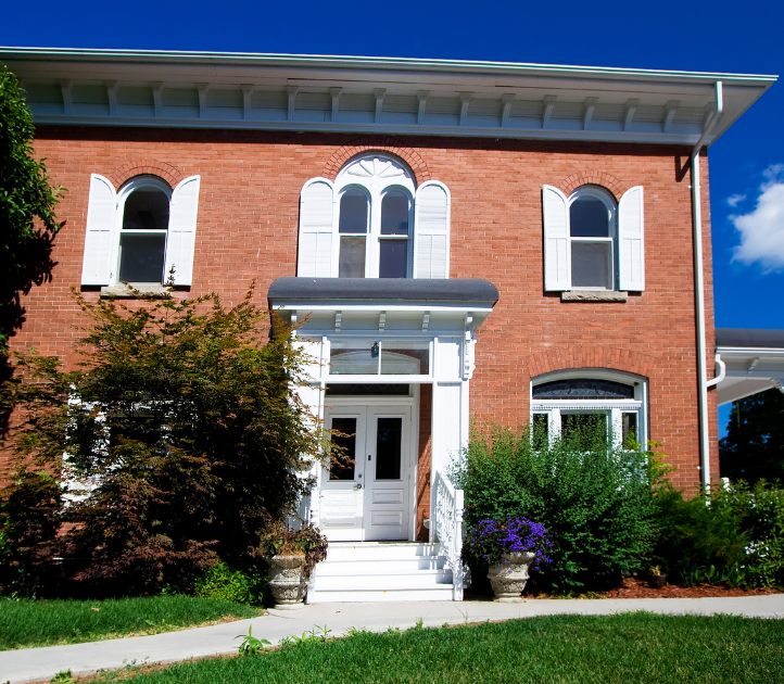 home with white vinyl portico