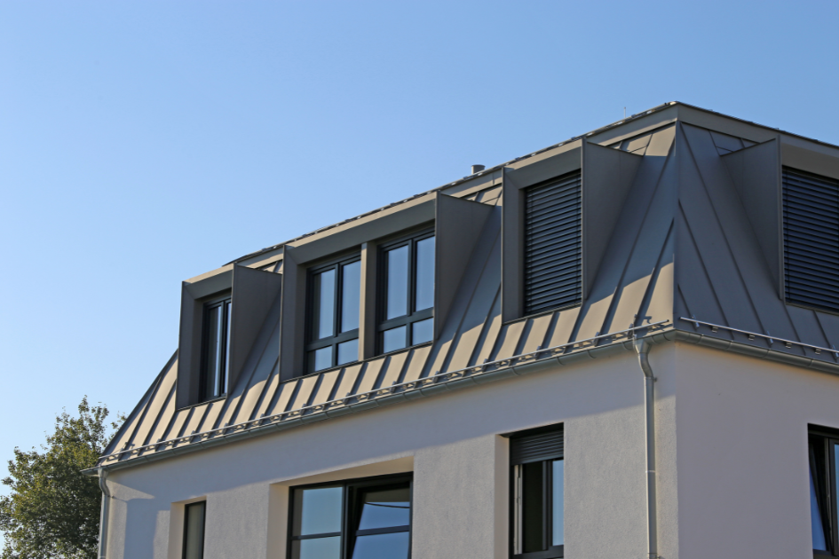 metal roof standing seam panels on modern house