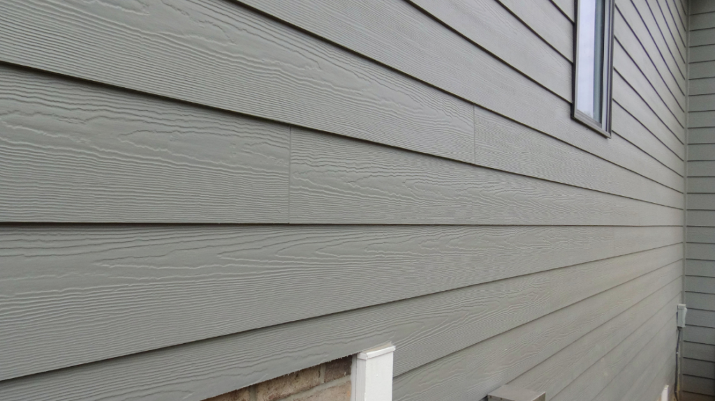 Sleek vinyl siding, installed to avoid rattling siding.