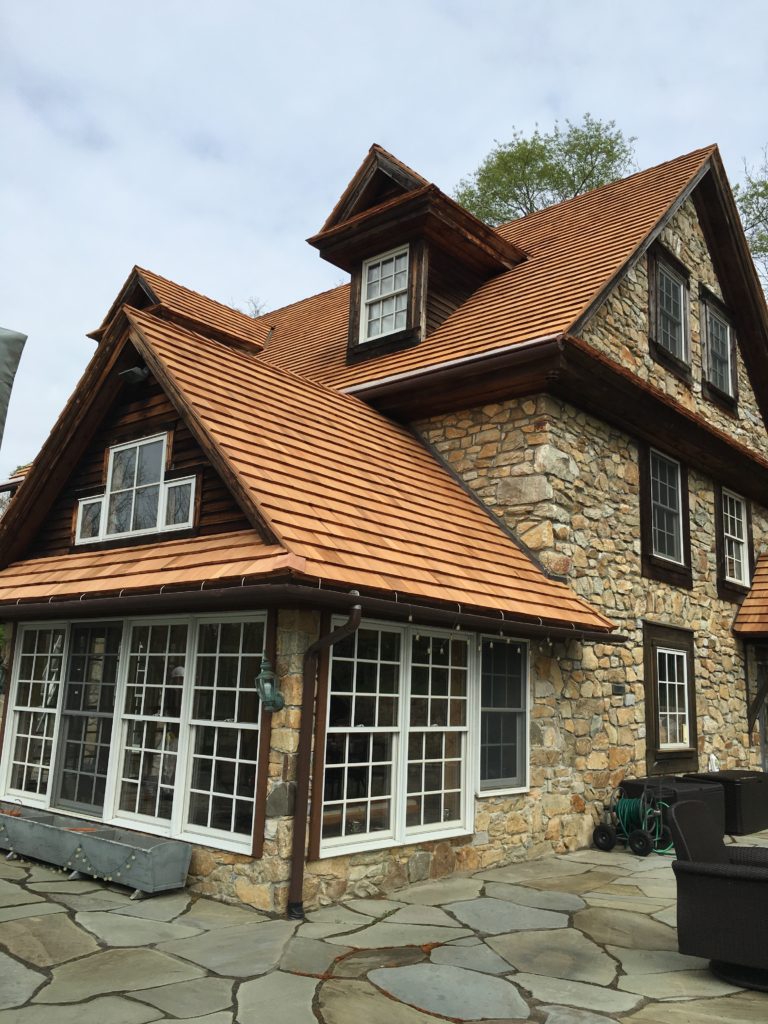 Image of a house with a cedar roof