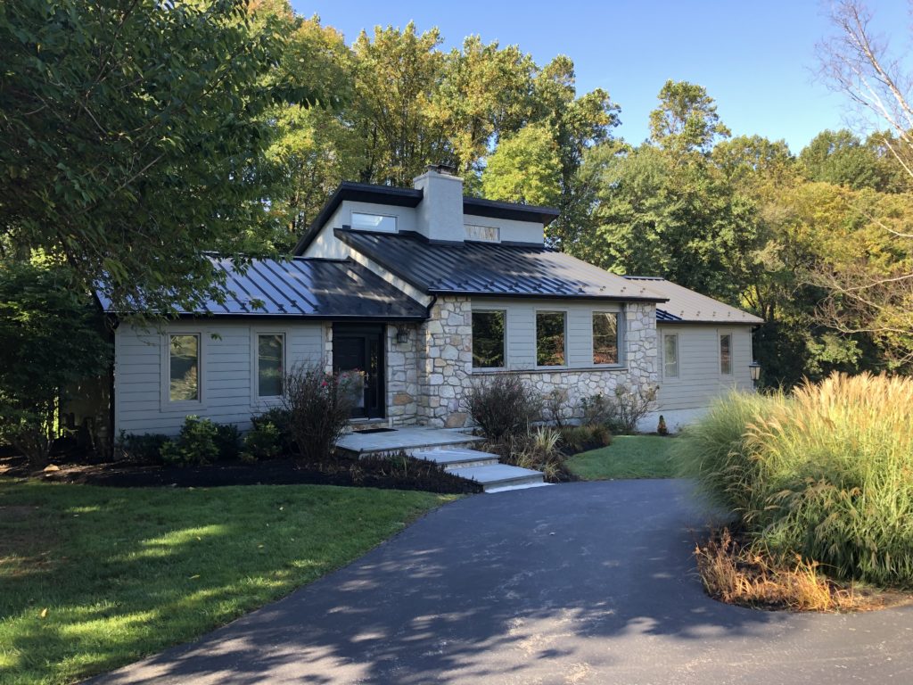 Image of a house with a metal roof