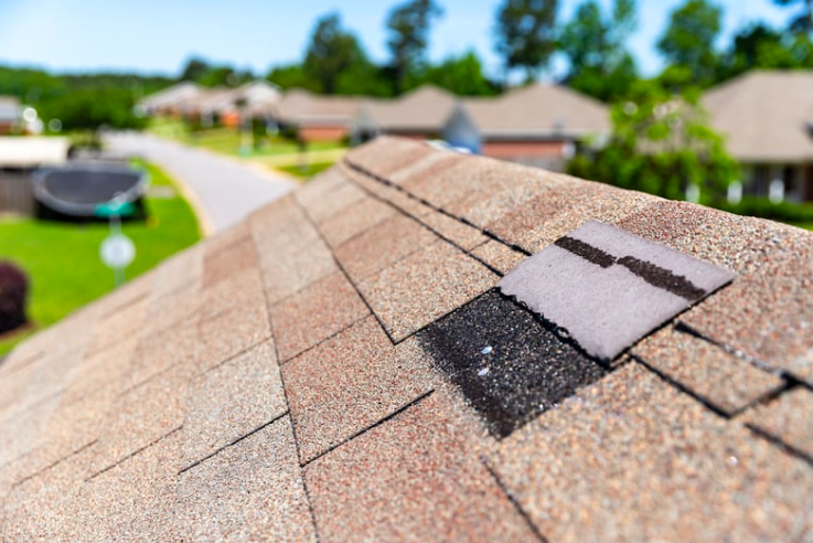 lifting shingle on synthetic shingle roof