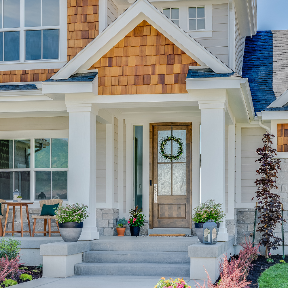 portico with thick white columns on stylish home