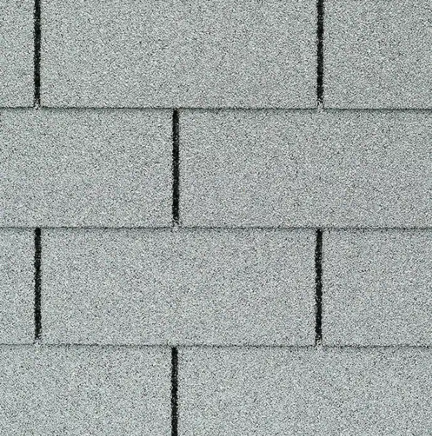 close up image of GAF 3-tab shingles in a very light, almost white grey.
